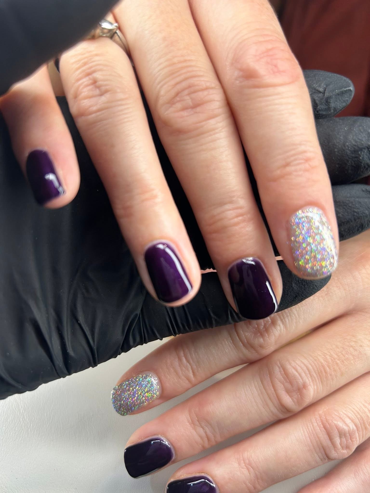 Hands purple with glitter