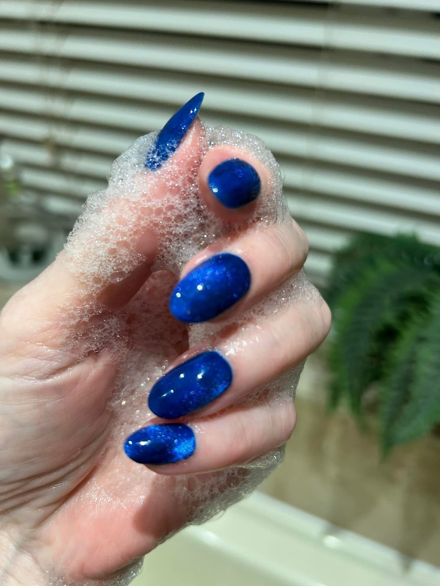 Hands blue cats eyes